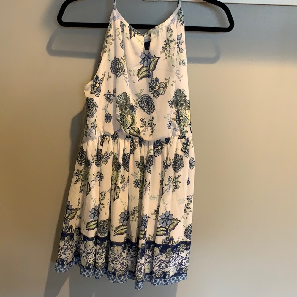 White dress with floral detailing